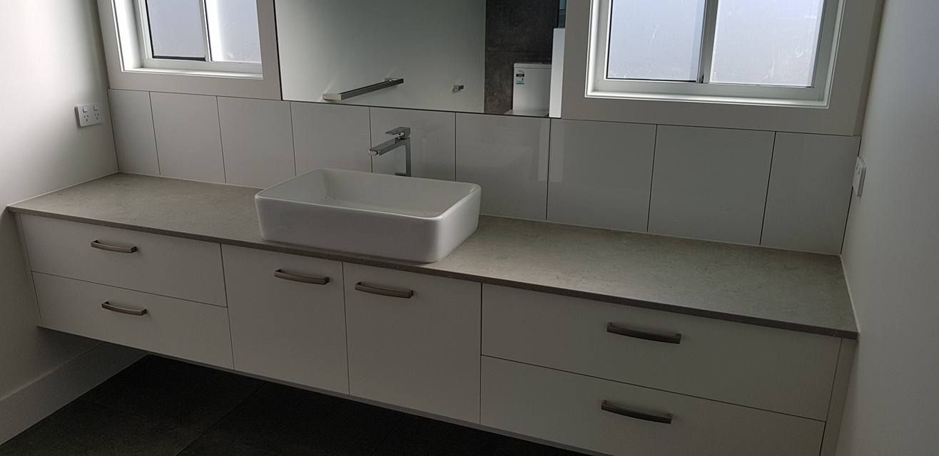 A Bathroom With A Sink, Mirror And Drawers — Alstonville Kitchens In Alstonville, NSW