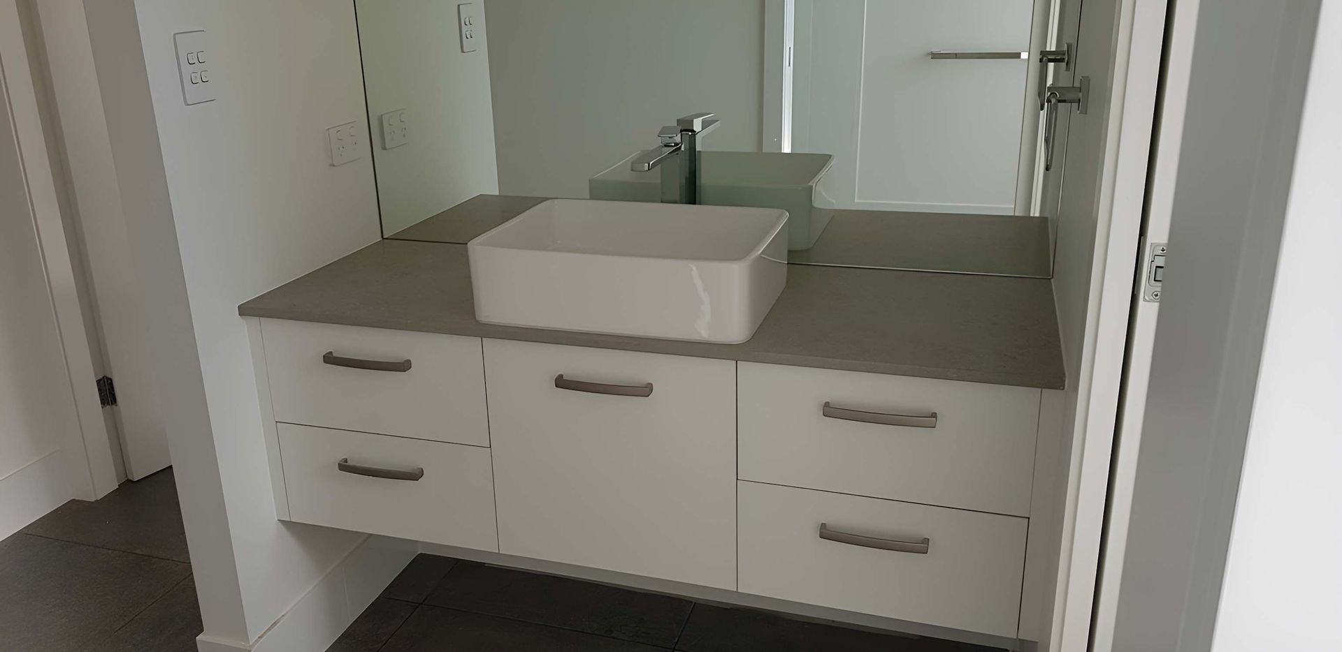 A Bathroom With A Sink, Mirror And Drawers — Alstonville Kitchens In Alstonville, NSW