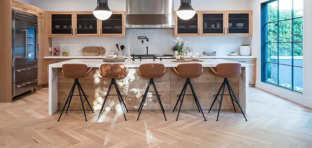 A Kitchen With A Large Island And Stools — Alstonville Kitchens In Alstonville, NSW