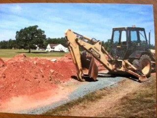Backhoe Digging Septic Lines | Scottsville, VA | Arthur's Septic Service