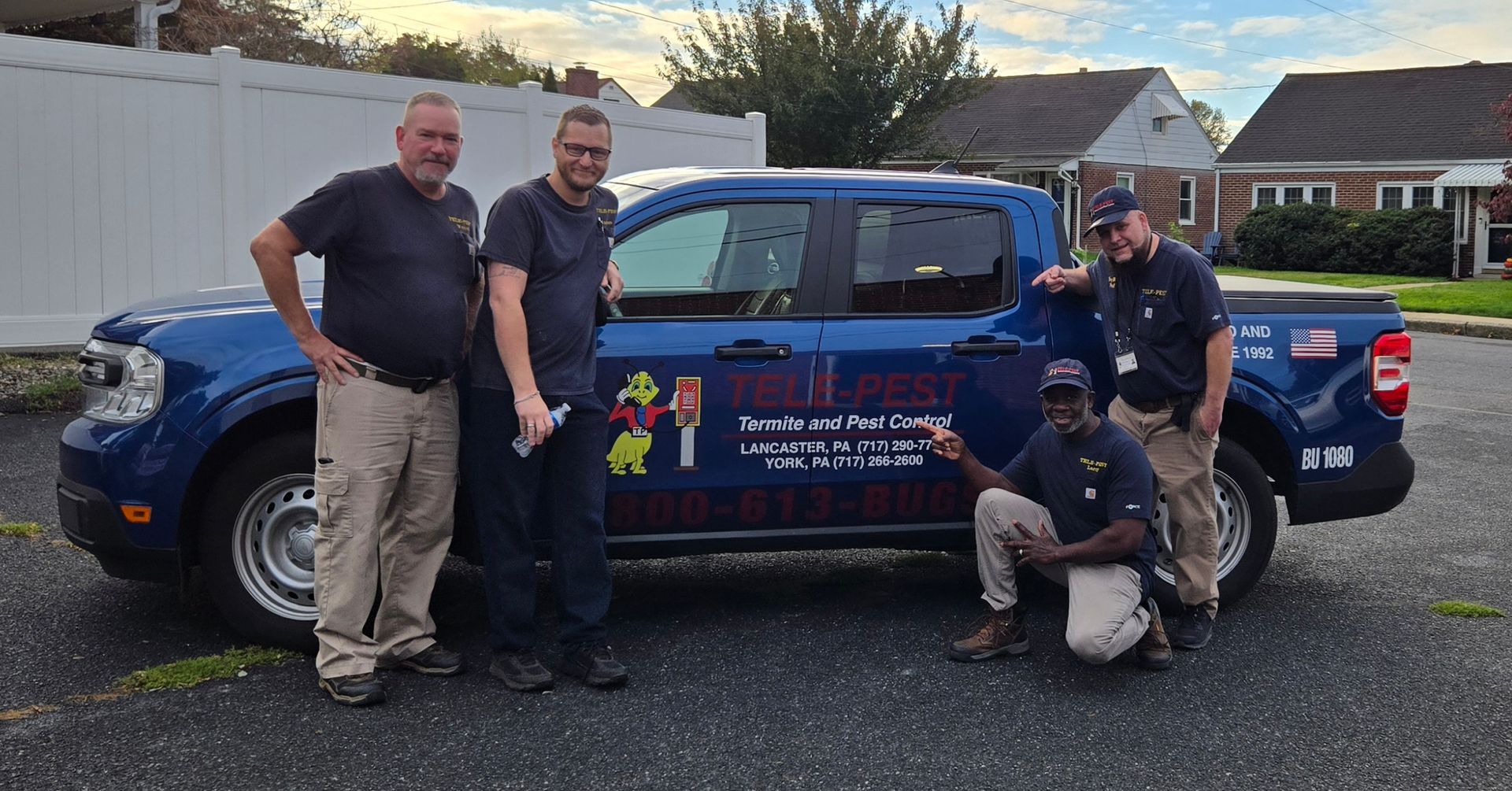 A person is spraying a concrete surface with a sprayer.
