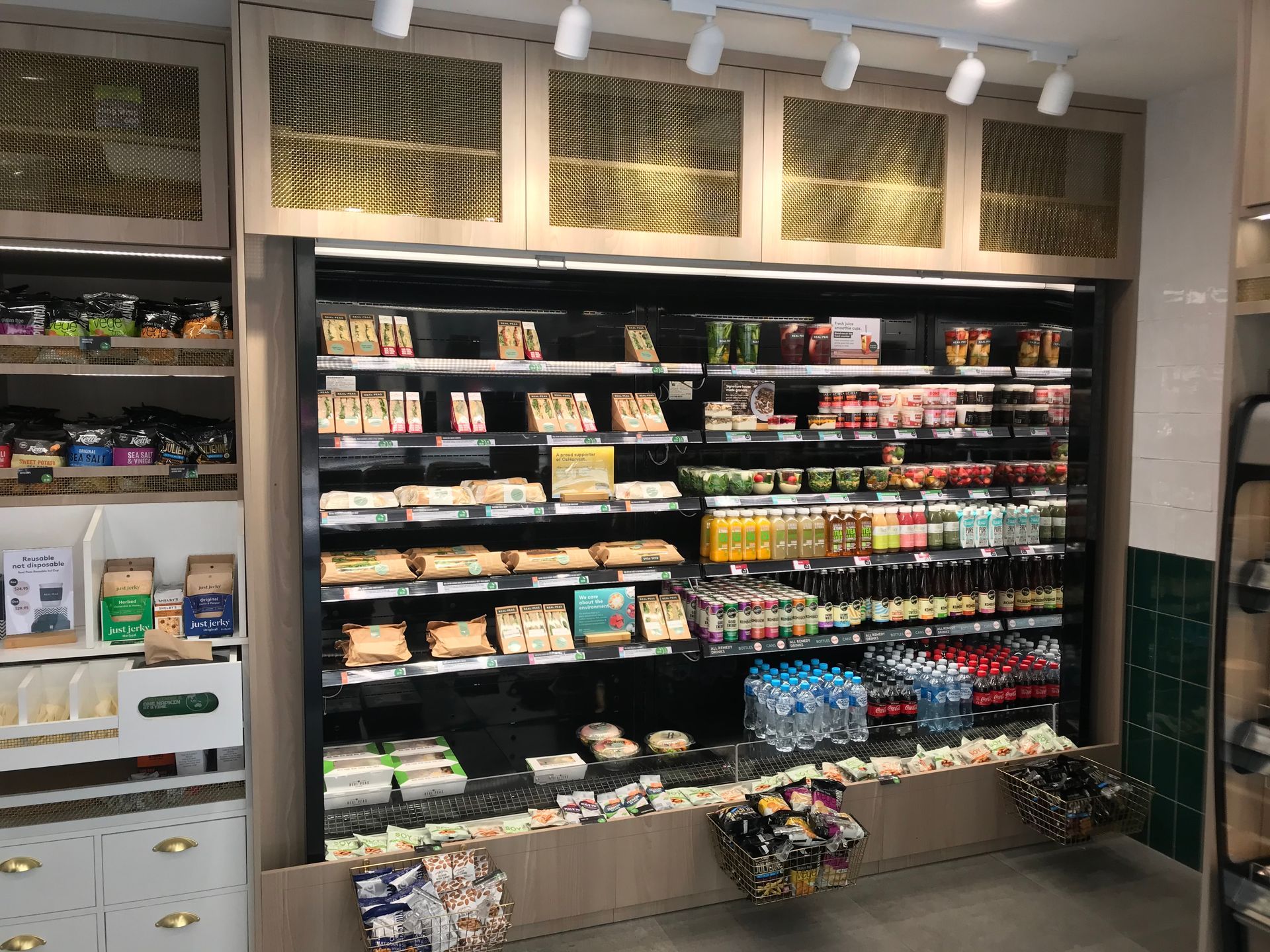 A Grocery Store Fridge With With Lots Of Food And Drinks — Nyon Shopfitters in Morisset, NSW