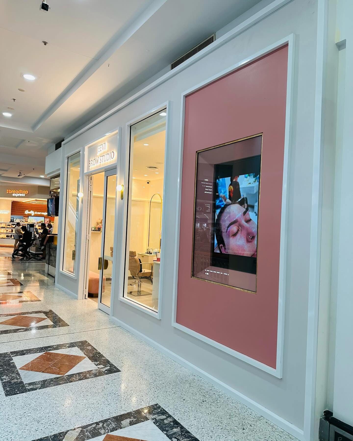 A Store With a Picture of a Woman On The Wall — Nyon Shopfitters in Morisset, NSW
