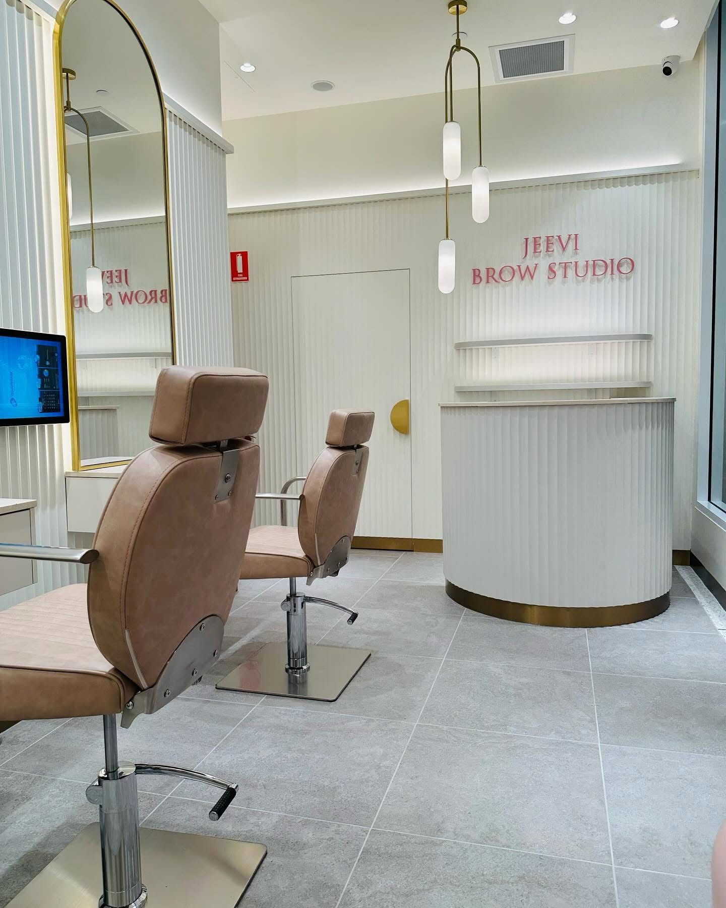 A Salon With Two Chairs and a Large Mirror — Nyon Shopfitters in Morisset, NSW