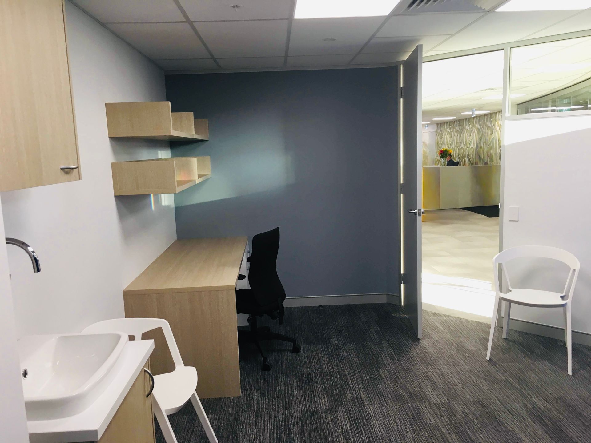 A Room With a Desk, Chair, Sink and Chairs — Nyon Shopfitters in Morisset, NSW