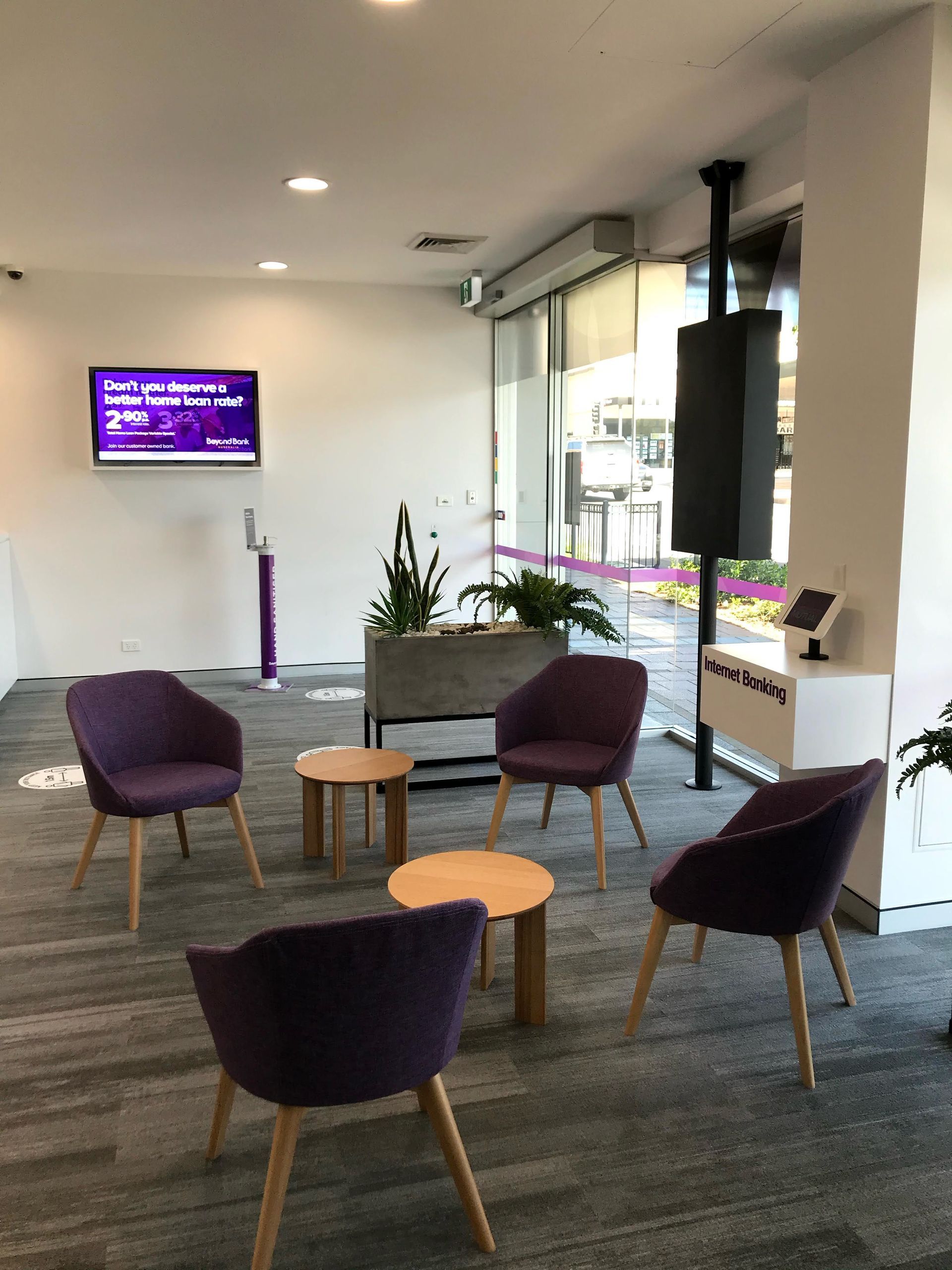 A Room With Purple Chairs and Tables in the Room — Nyon Shopfitters in Morisset, NSW