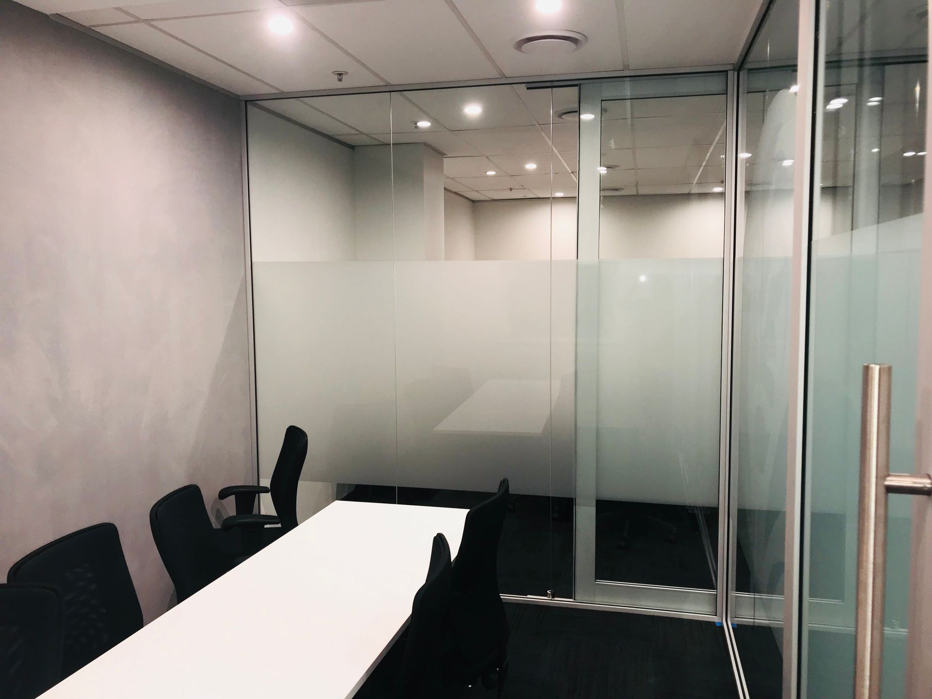 A Conference Room With a Table and Chairs in it — Nyon Shopfitters in Morisset, NSW