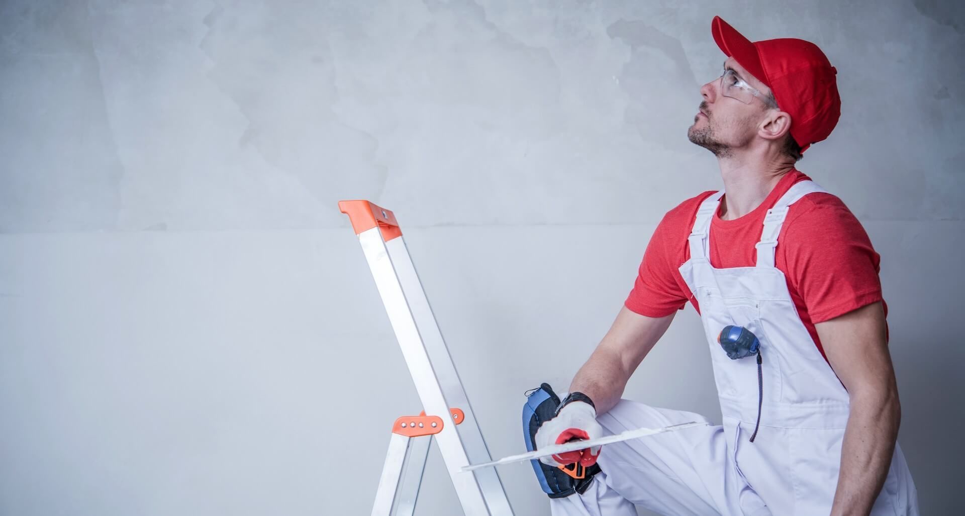 Man planning how to remodel his basement