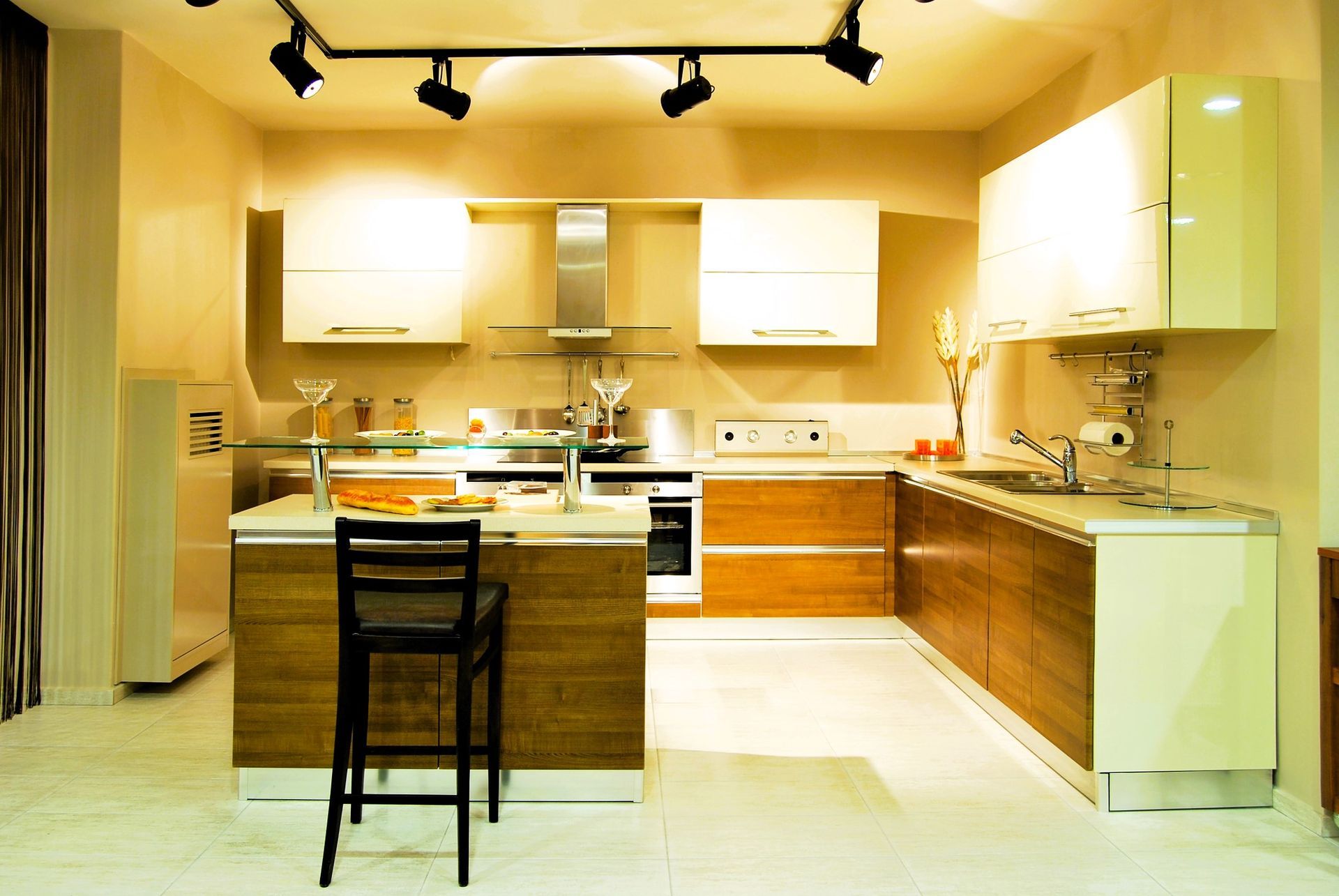 Modern basement kitchenette with wooden cabinets and an island, designed for functionality and style