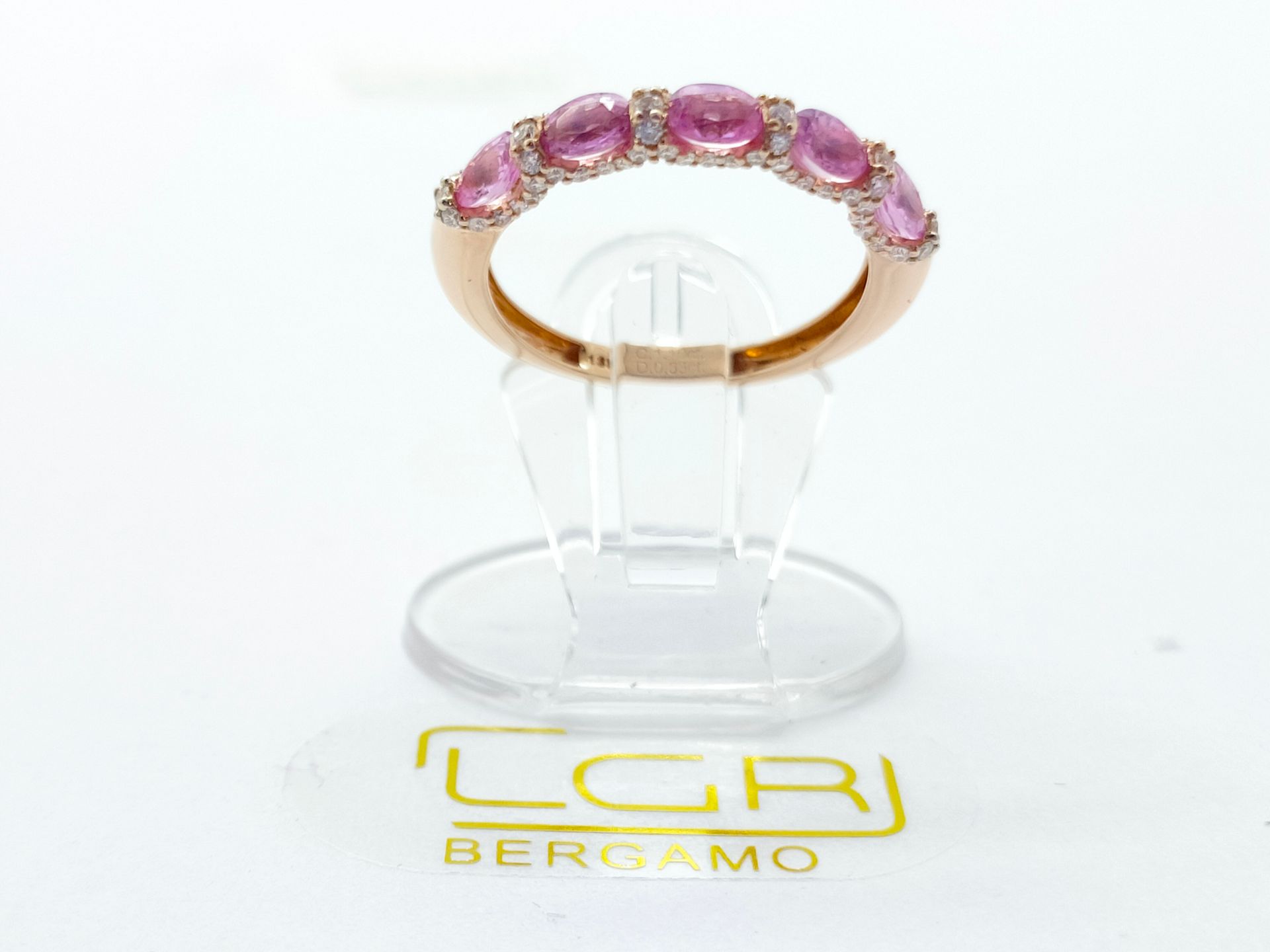 anello oro rosa con zaffiri rosa e diamanti