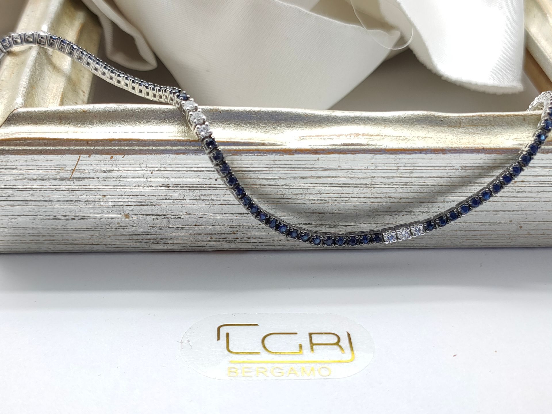 tennis oro bianco con zaffiri e diamanti