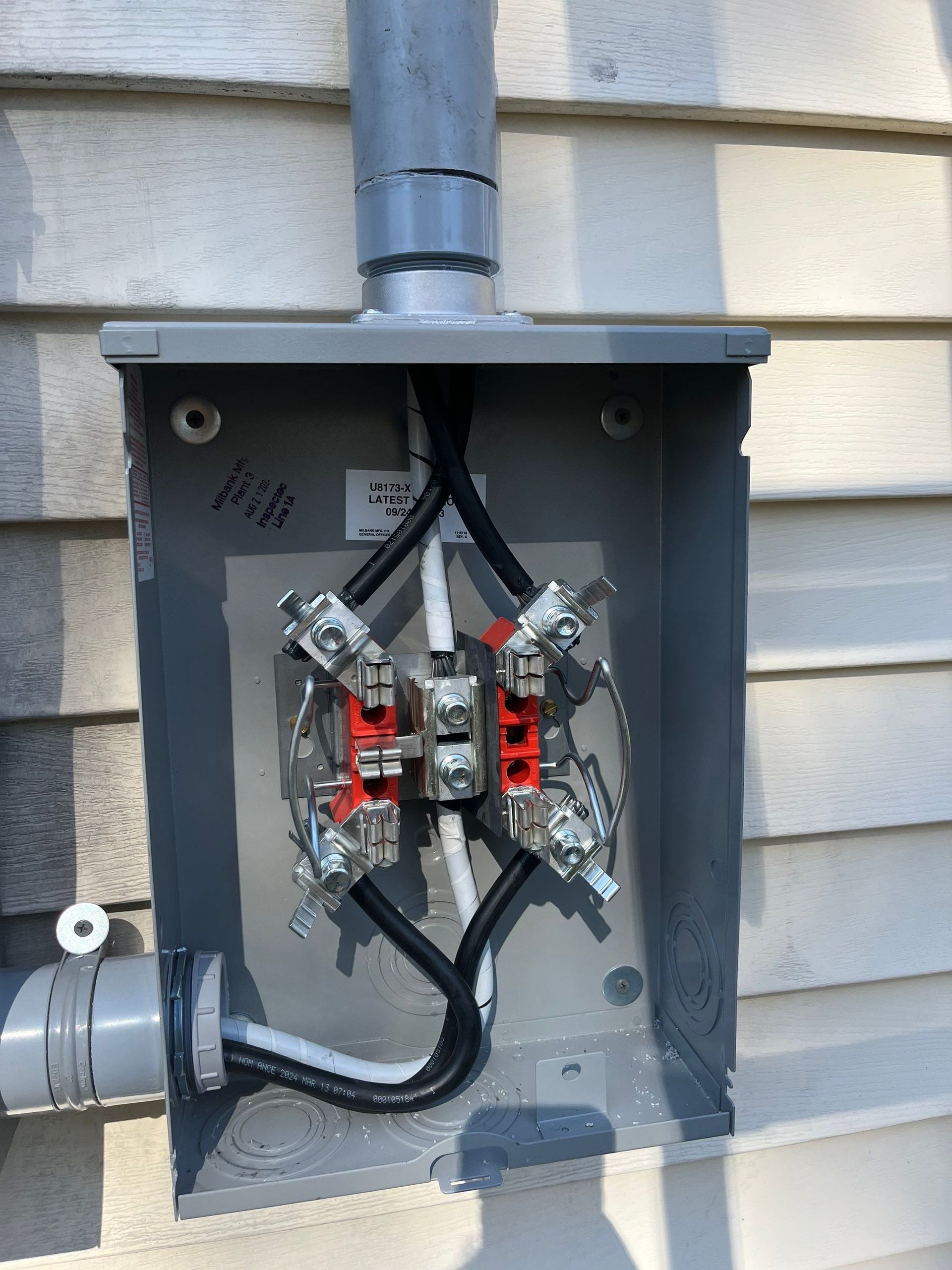 New meter pan installation and upgraded service conductors during a 150 amp electrical service upgrade in Piscataway, NJ.