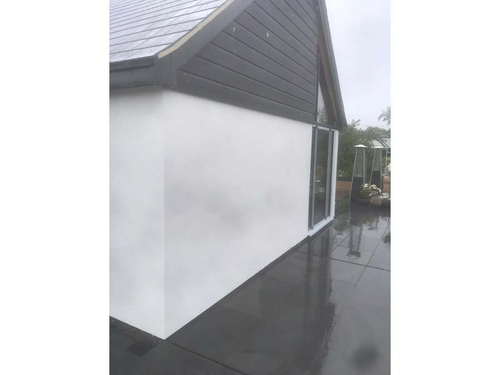 Finished silicone render on garage conversion after EWI installation in Leigh-on-Sea, Essex.