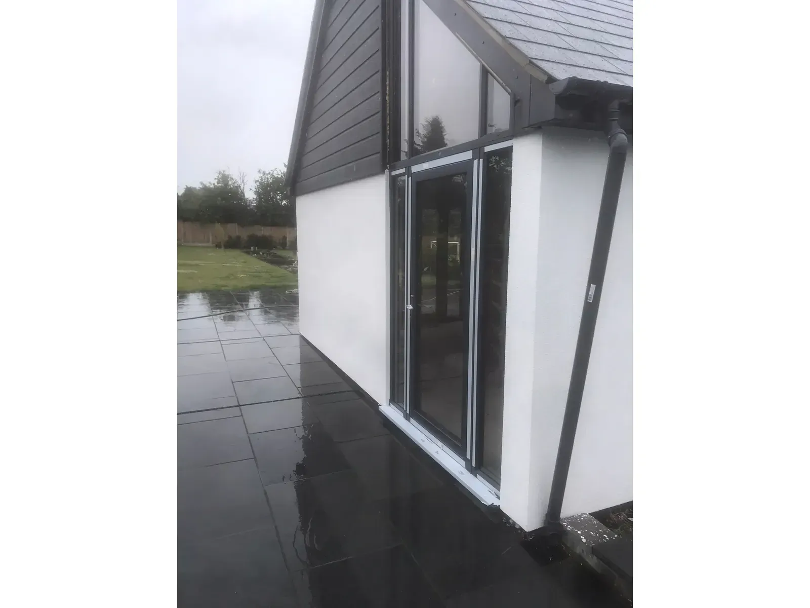 Finished silicone render on garage conversion after EWI installation in Leigh-on-Sea, Essex.