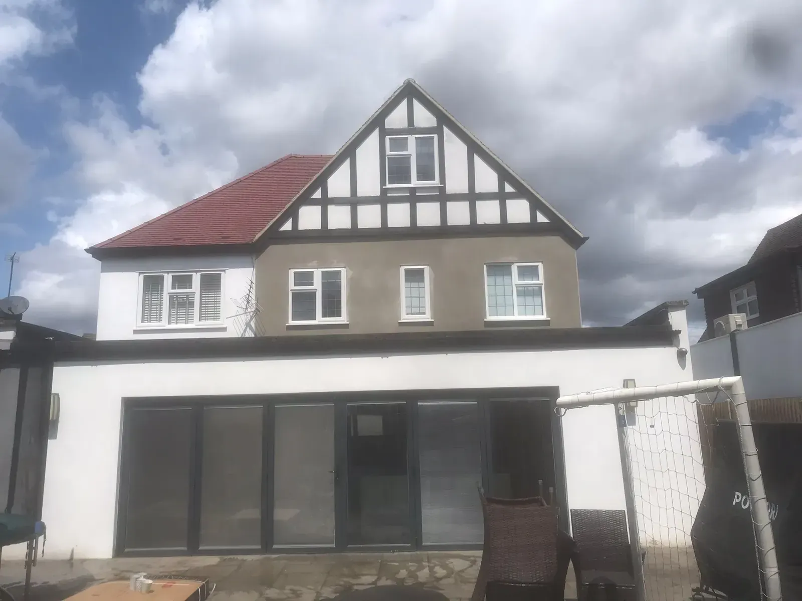 Failed render hacked off back to brick in Billericay with a clean, consistent finish ready for masonry paint.