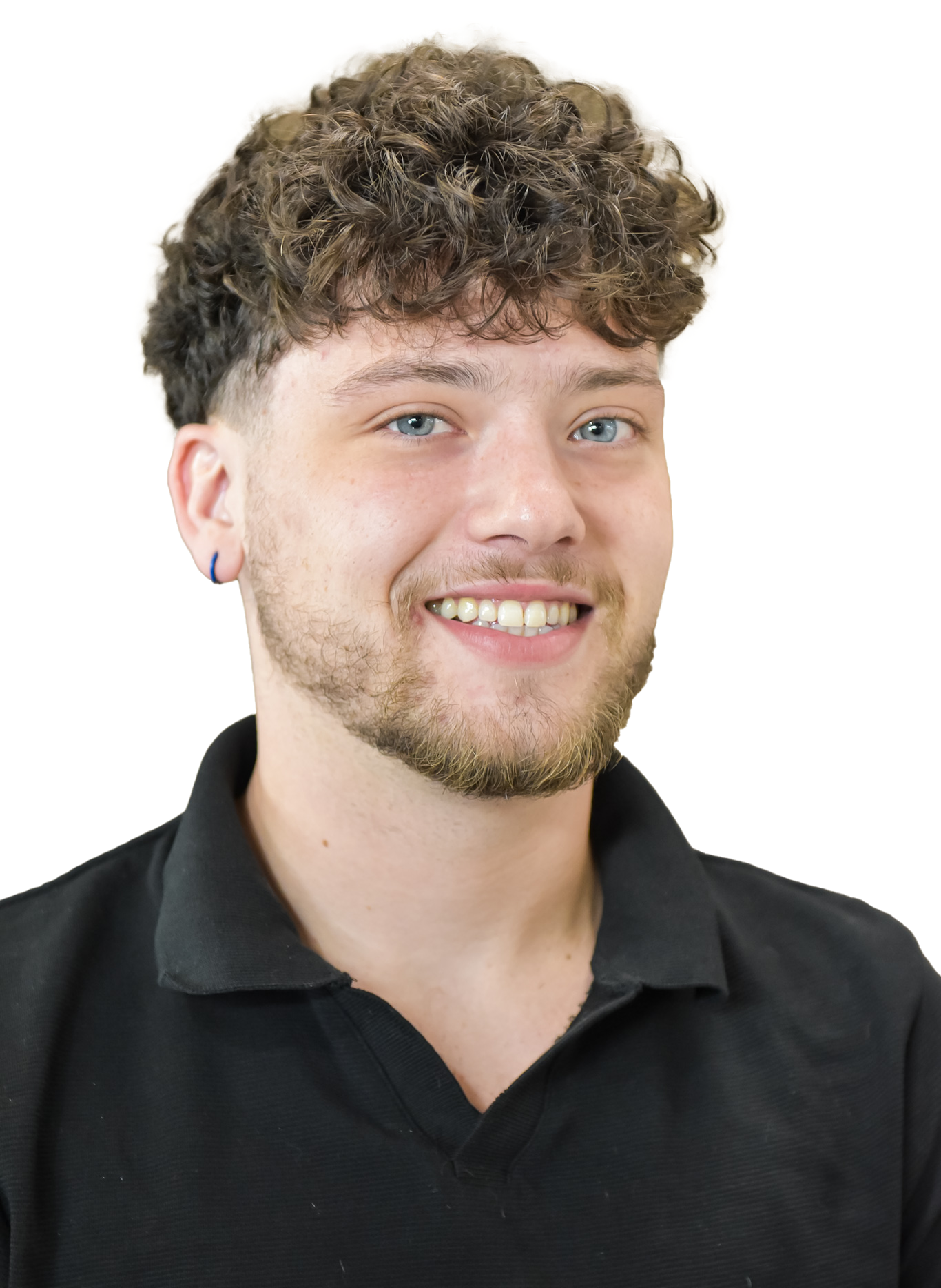 Young man with curly brown hair smiles, wearing a black shirt.
