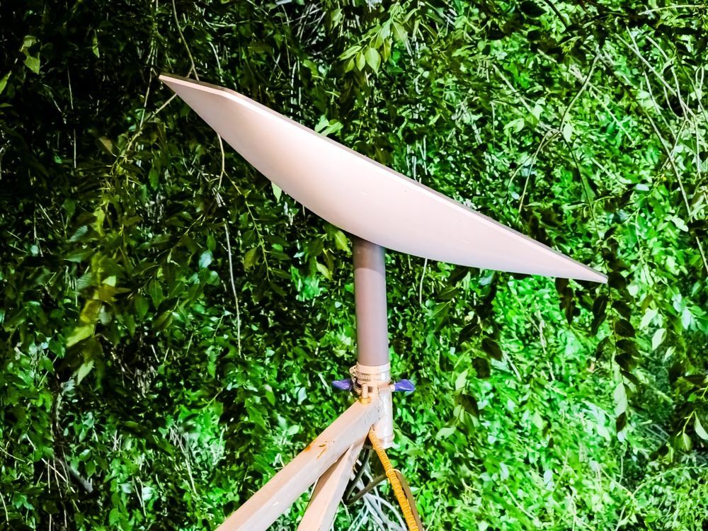 White Satellite Dish Mounted on a Tripod — PowerMaster Batteries Moree in Narrabri, NSW