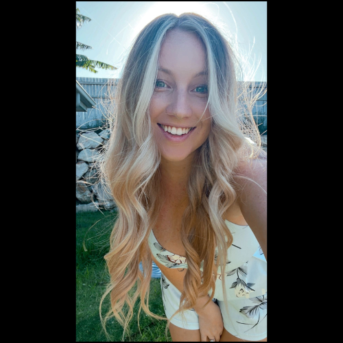 A Blond Woman Smiling