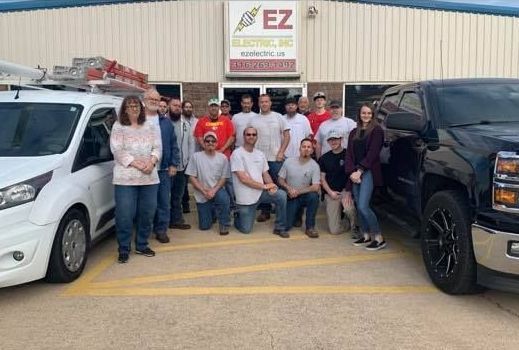 A lake surrounded by snow covered mountains and trees