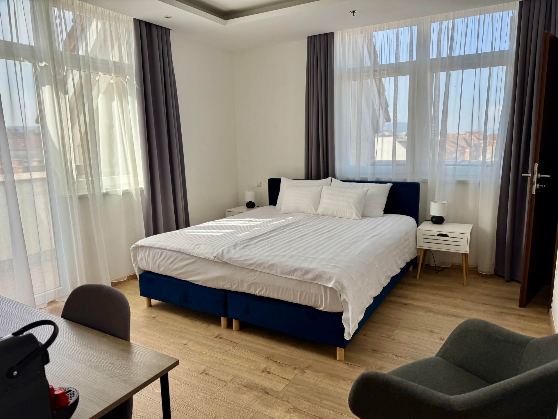 There is a large bed in the middle of the room.