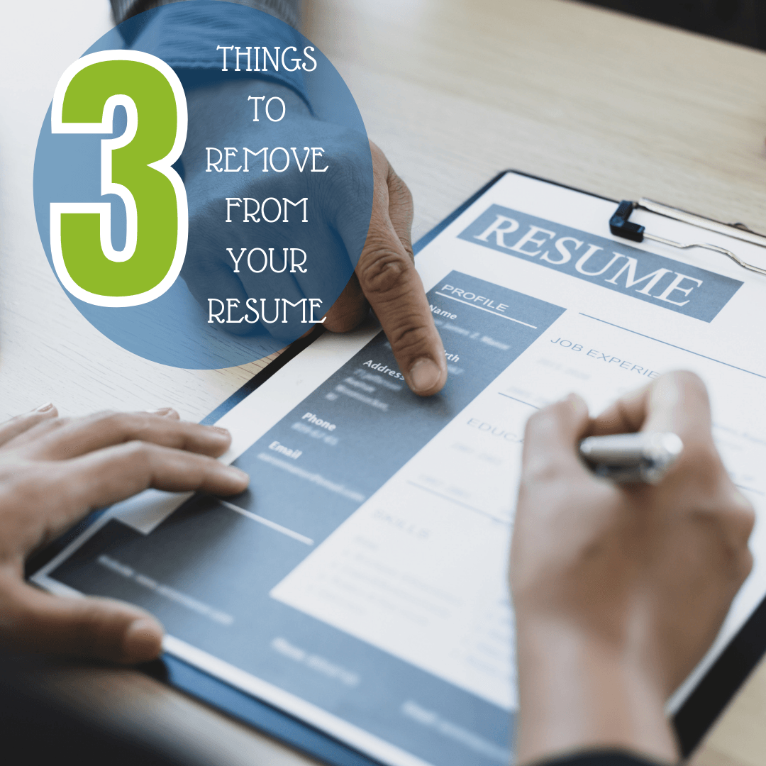 A person is writing on a clipboard that says things to remove from your resume