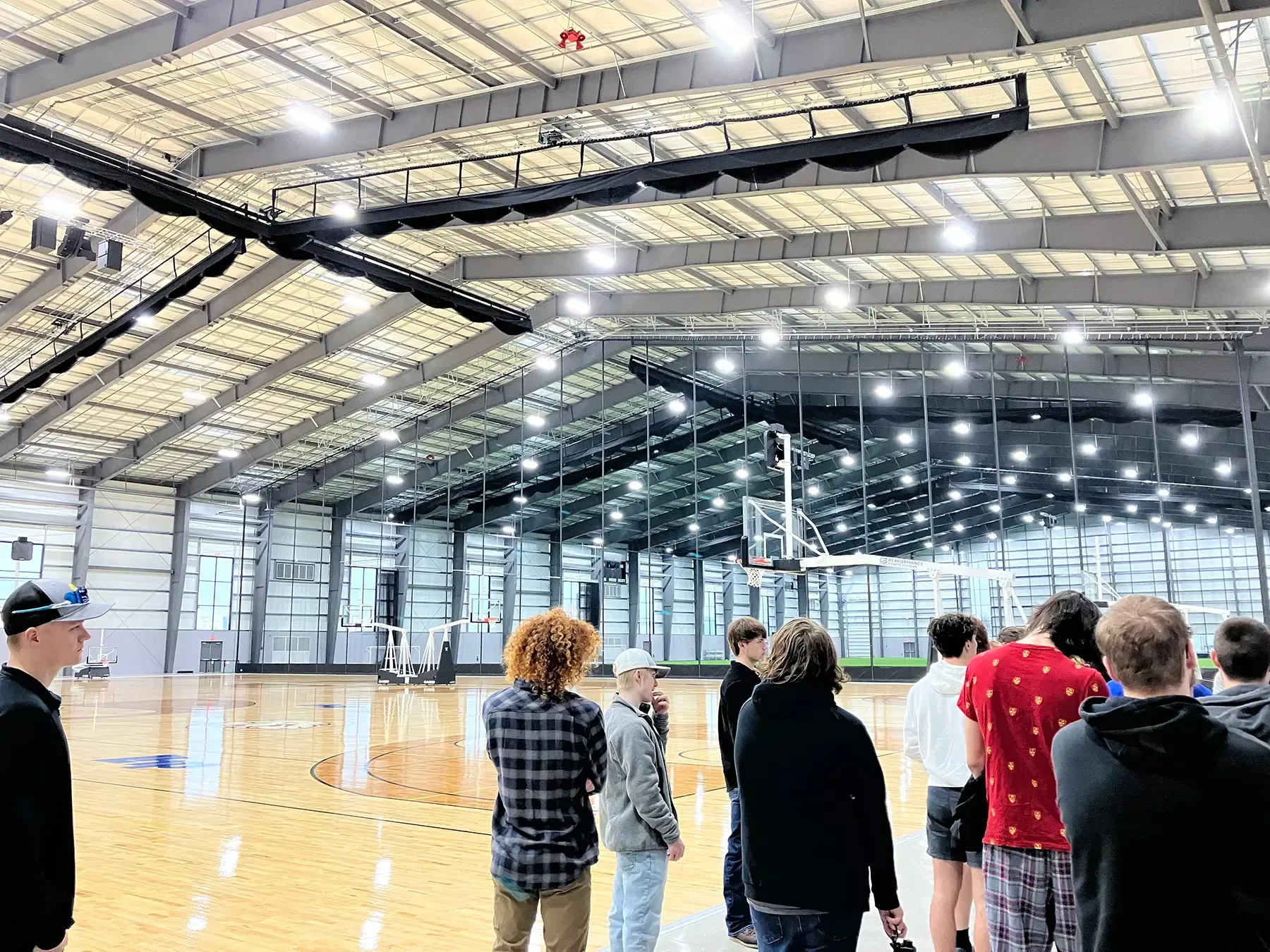 Photo of Force Construction providing a tour of the Circle-K Fieldhouse to high school students