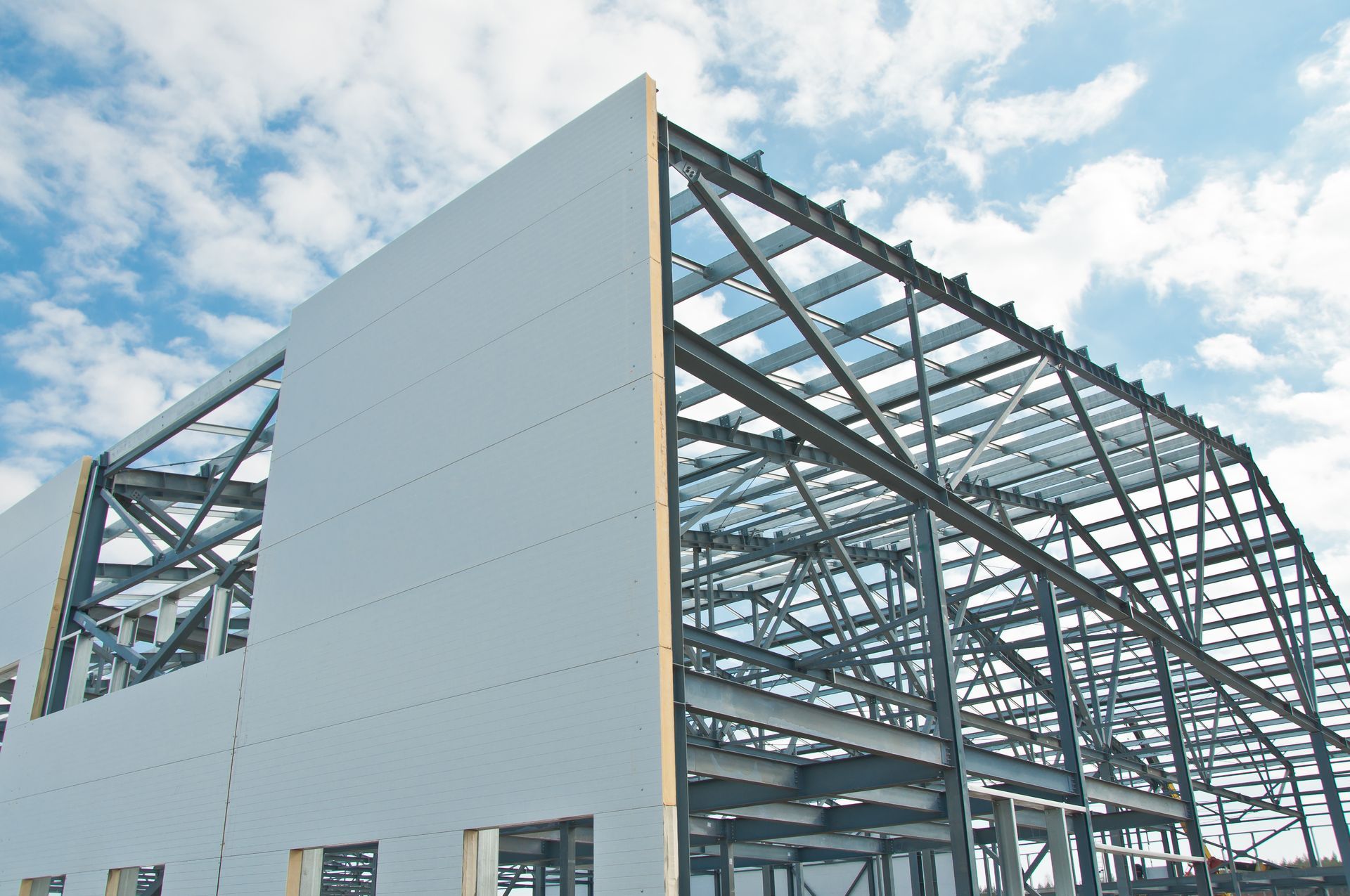 A building under construction with insulated panels. A building under construction with insulated panels.
