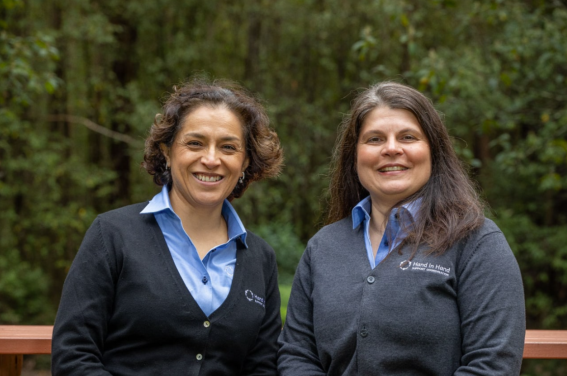 A sunflower is growing in a field at sunset.