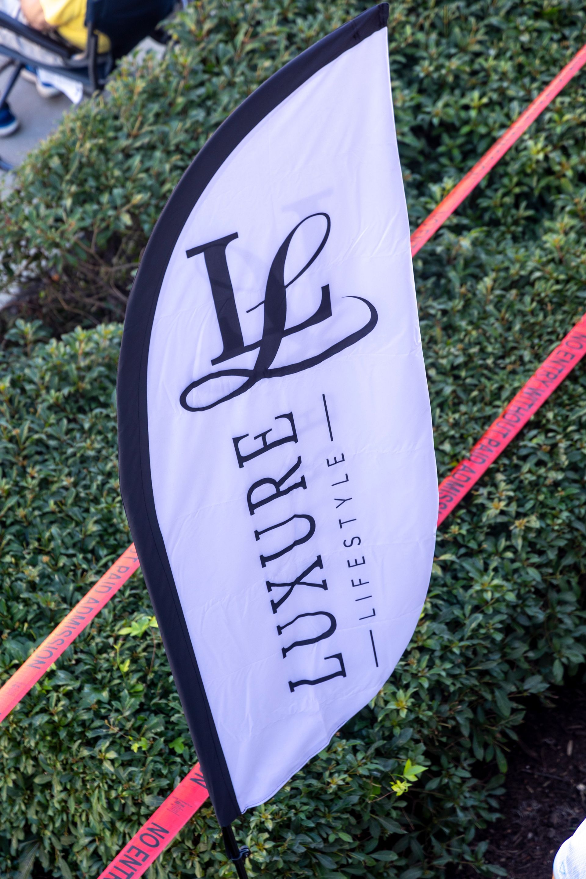 White and black Luxure Lifestyle flag with an