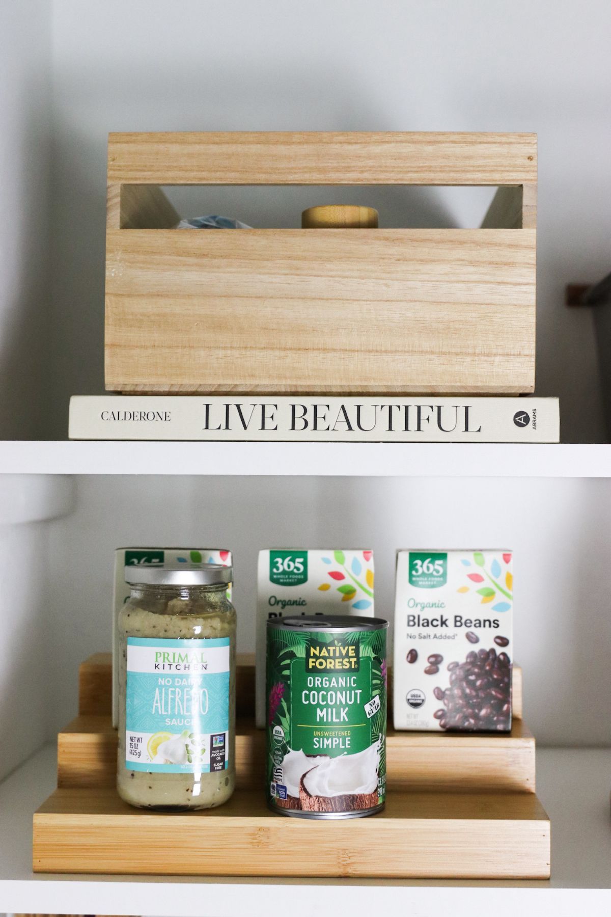 Shelf with wooden organizer, book (
