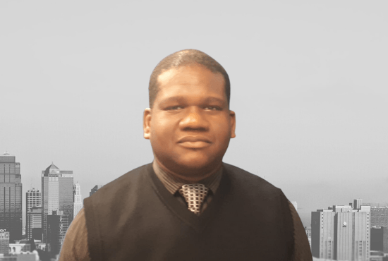 A man in a vest and tie is standing in front of a city skyline.