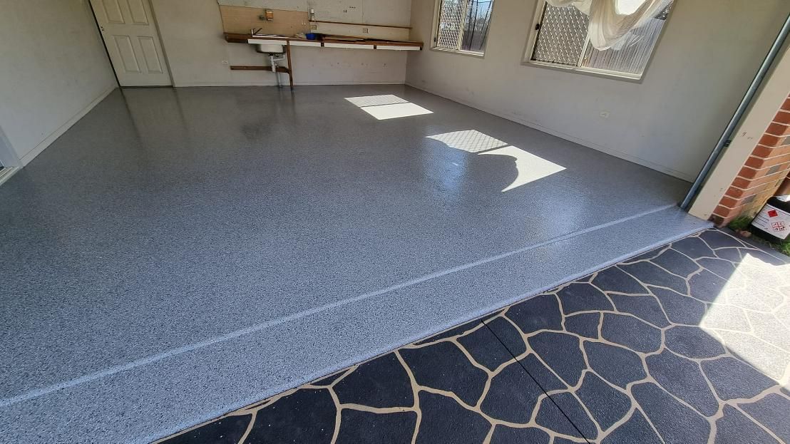 A Garage with A Concrete Floor and A Stone Floor — SRS Concreting in Ipswich, QLD