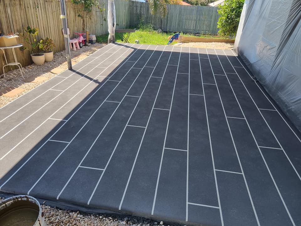 Grey Striped Patio Deck — Qualified Concreters in Toowoomba, QLD