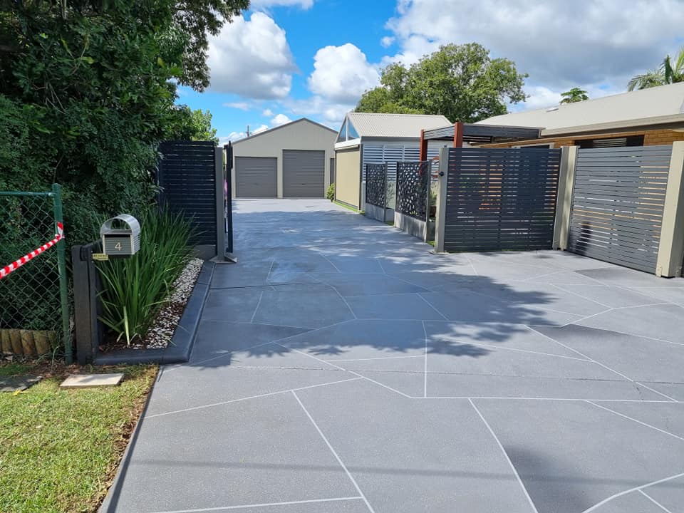 Home With Stone Driveway — Qualified Concreters in Toowoomba, QLD