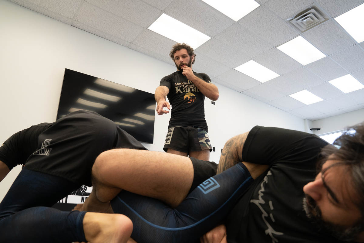 Adults drilling Brazilian Jiu-Jitsu techniques at All in Jiu-Jitsu in Green Brook, NJ, building confidence.