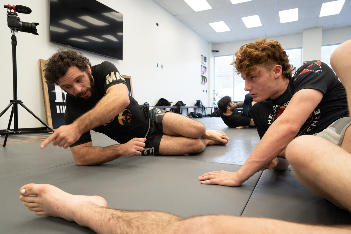 Adults practicing Jiu Jitsu at All in Jiu-Jitsu in Green Brook, NJ, building calm focus.