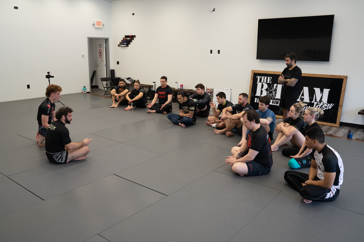 Adult students drilling Jiu Jitsu techniques at All in Jiu-Jitsu in Green Brook, NJ.