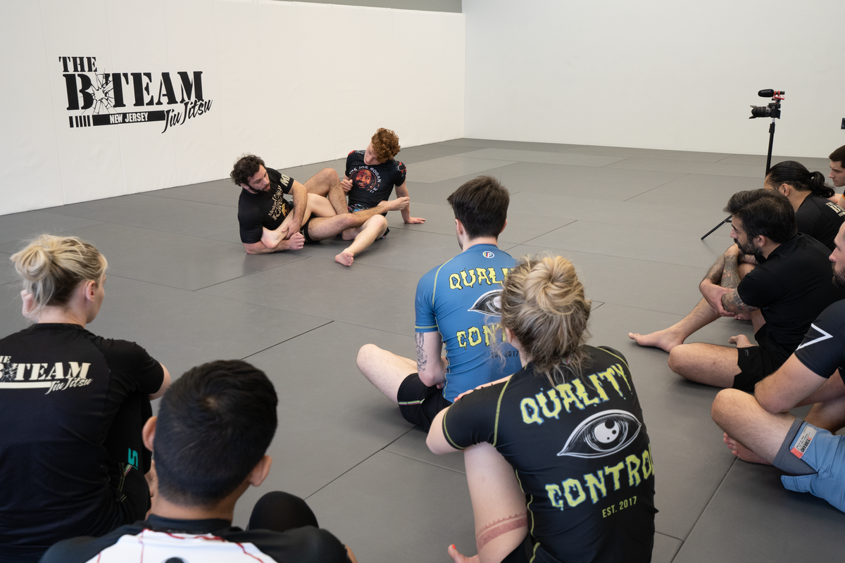 Students drilling Jiu Jitsu control positions at All in Jiu-Jitsu in Green Brook, NJ.