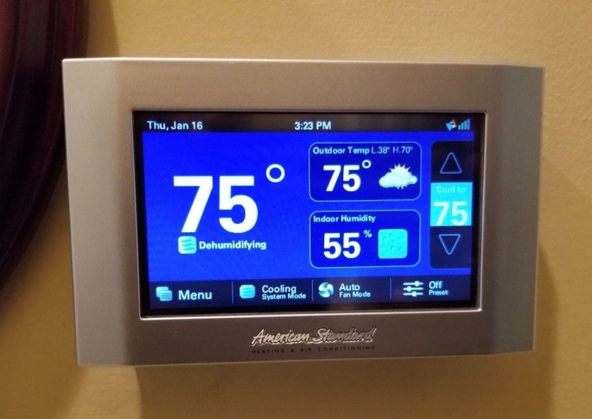 HVAC tech working in house
