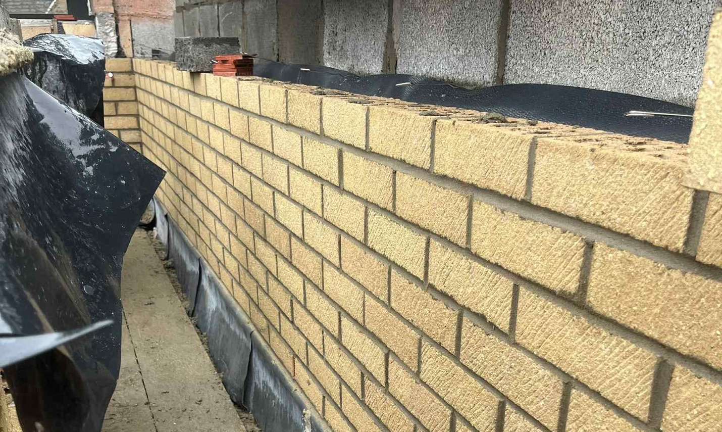 reviews and feedback from customers with a brick wall in the garden