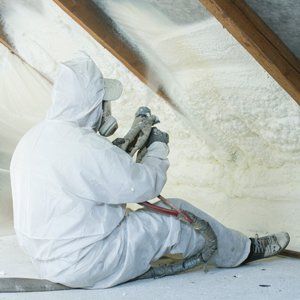 Spray Foam — Man Installing Spray Foam On Roof in Lauderdale, FL