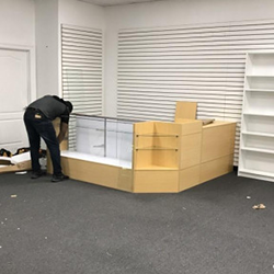 man assembling new furniture