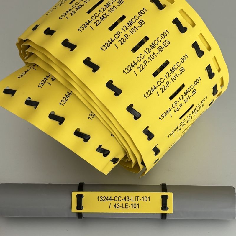 Yellow tie on tags printed by Identimark