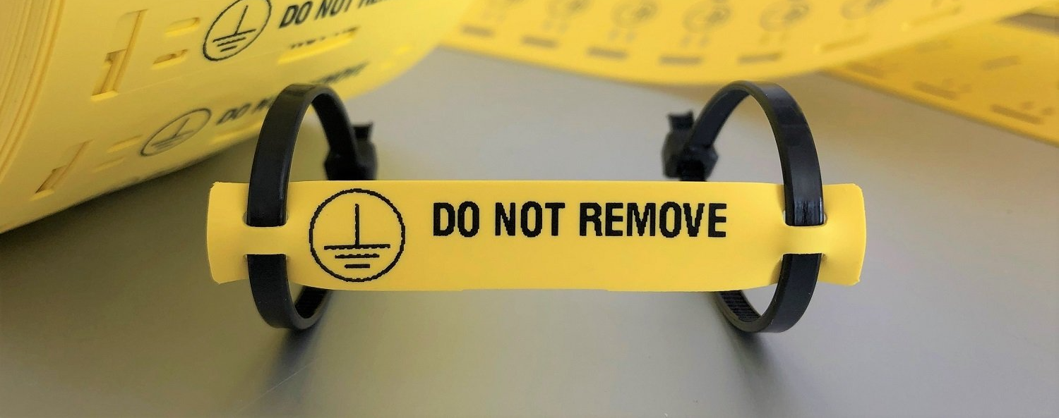 yellow cable tag printed do not remove by Identimark