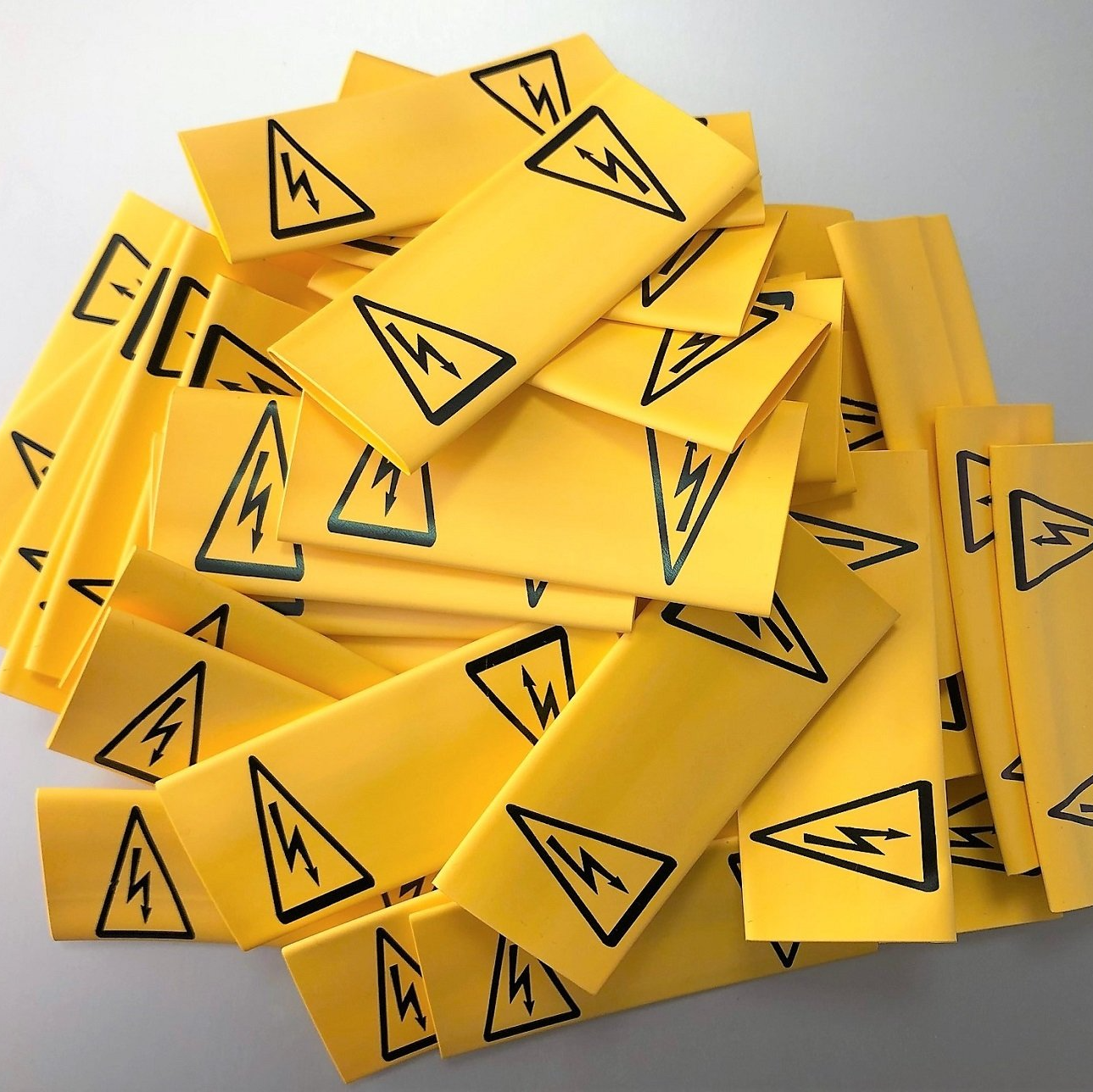 yellow heatshrink hazard warning labels printed by Identimark