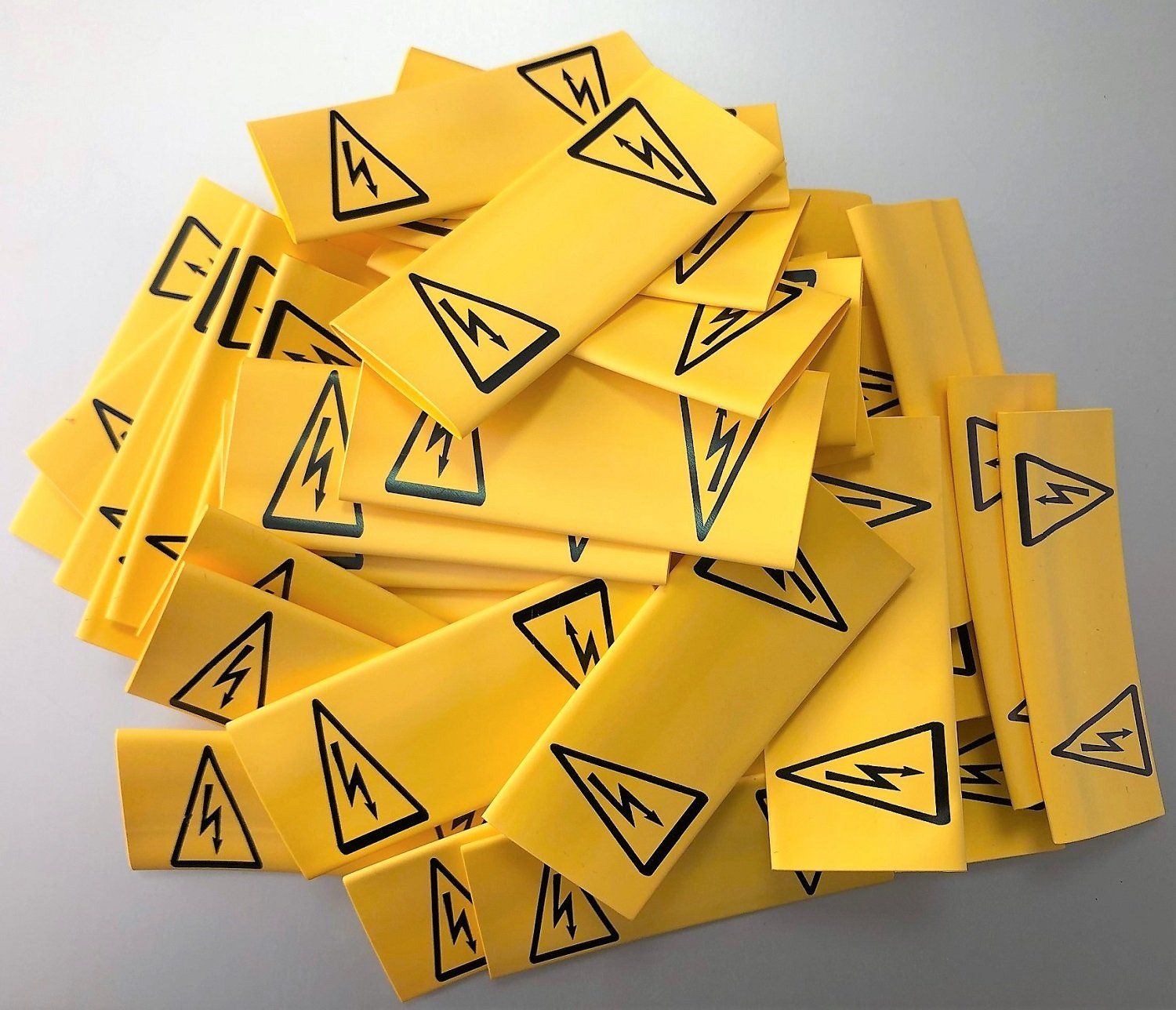 yellow heatshrink hazard warning labels printed by Identimark