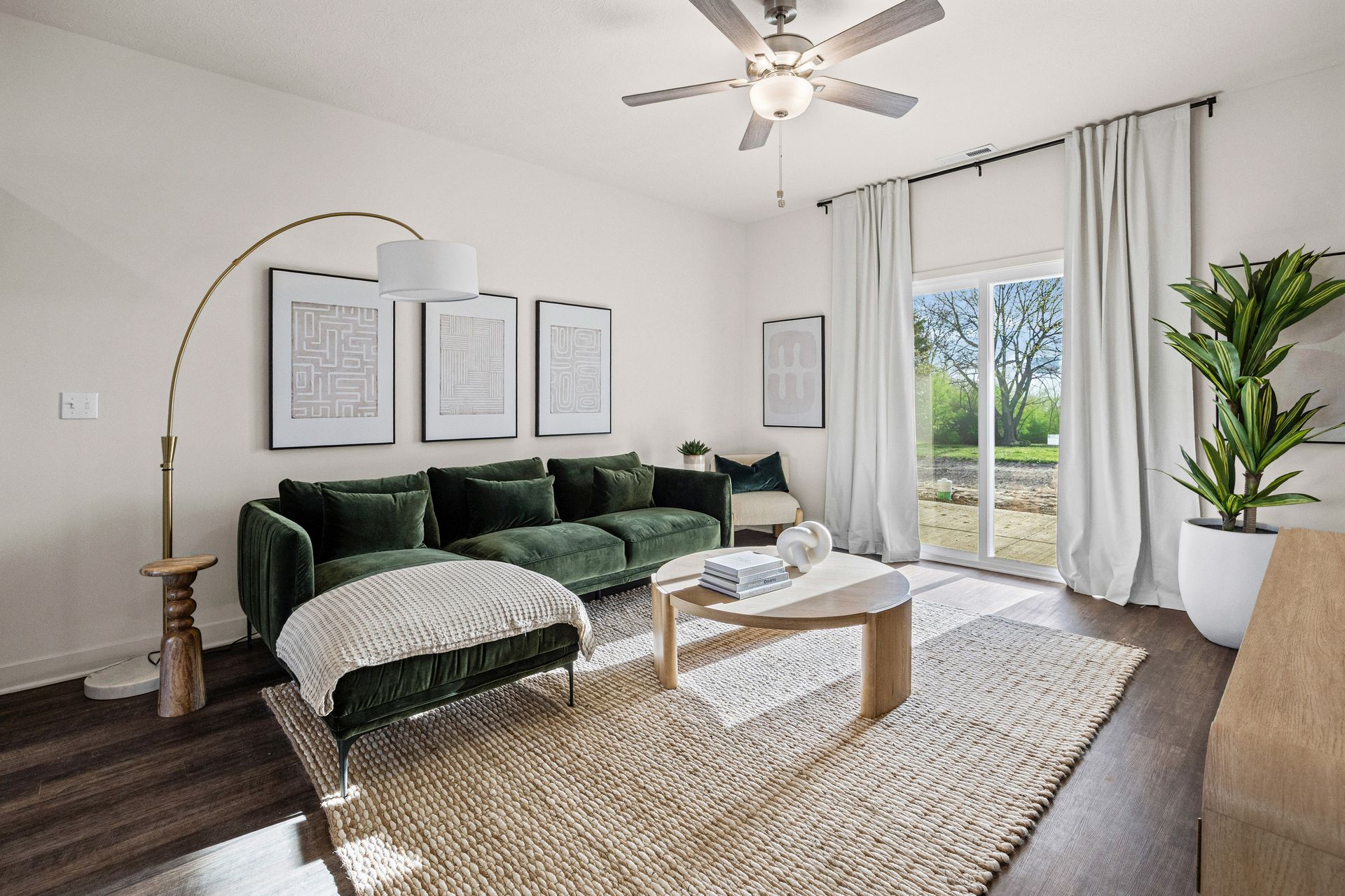 Spacious, bright living room with walk-out patio