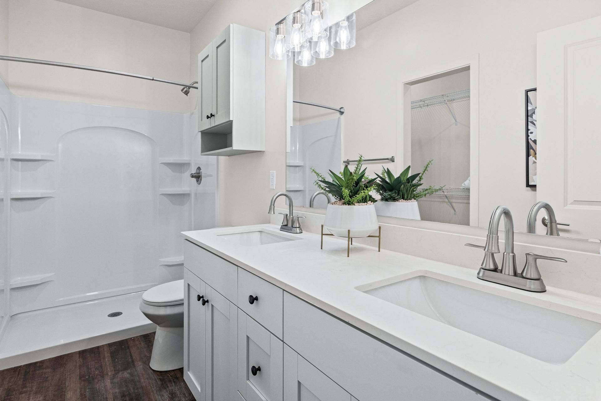 Walk-in shower in every unit's primary bedroom