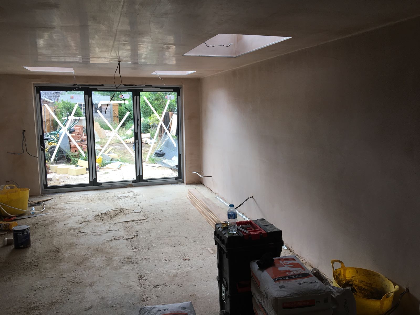 Lounge being plastered