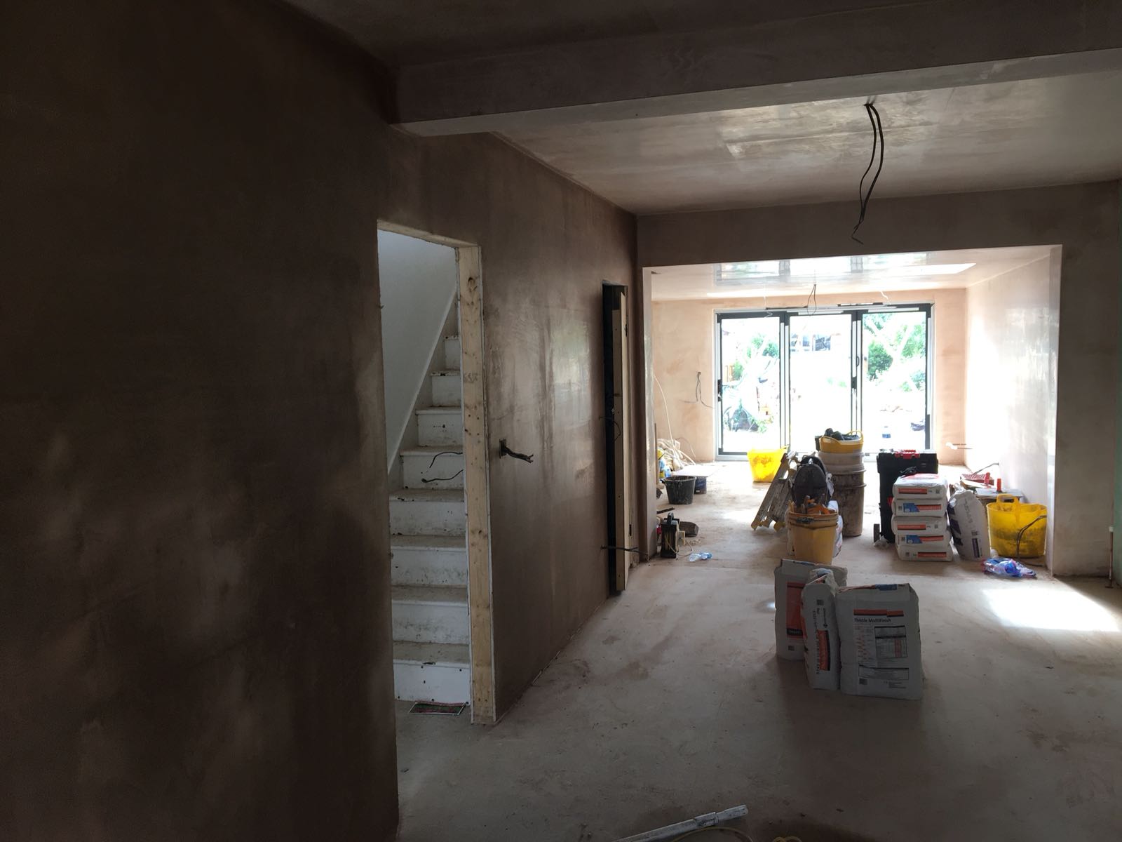 Lounge being plastered
